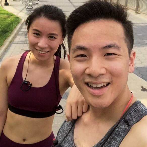 Two sweaty people outdoor on sidewalk